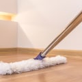 What is the best way to clean hardwood floors during a spring deep cleaning?
