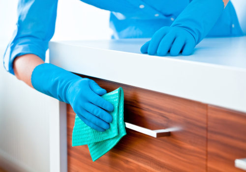 What is the best way to clean cabinets during a spring deep cleaning?